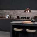 Empire Aluminium Mosaic silver and bronze metallic mosaic with a copper pendant light above a kitchen island