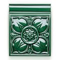 Deep green ceramic wall tile with raised floral design and glossy finish from empress dado malachite collection