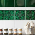 Green ceramic empress dado pearl tiles with raised floral and leaf patterns for decorative wall use