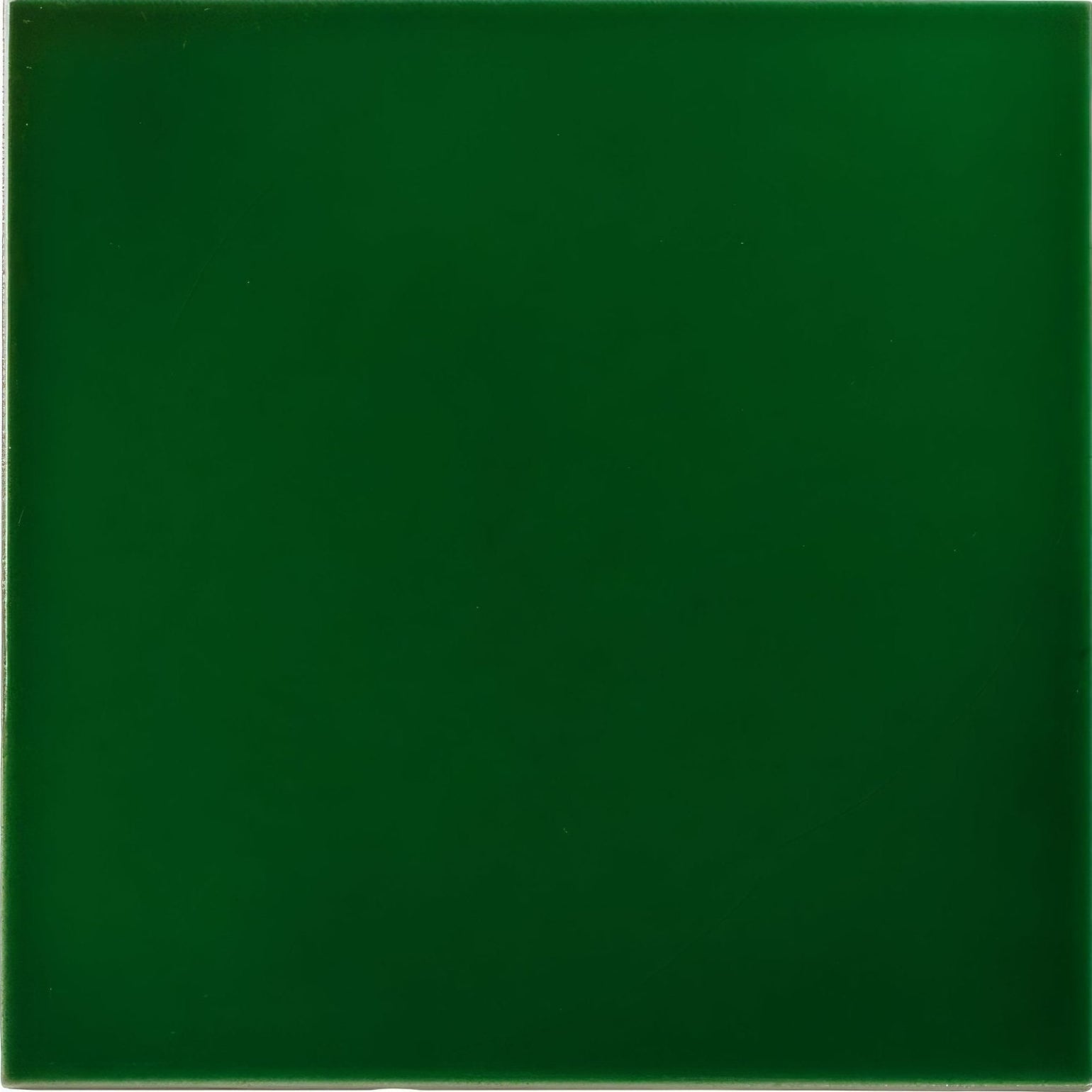 Solid emerald green ceramic tile empress malachite base with smooth glossy finish ideal for elegant interiors