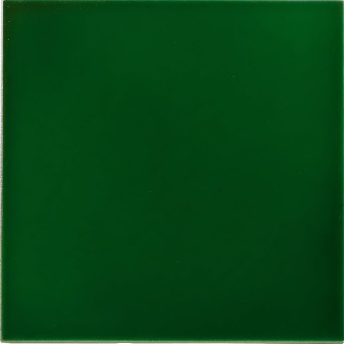 Solid emerald green ceramic tile empress malachite base with smooth glossy finish ideal for elegant interiors