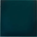 A smooth square ceramic tile with a deep teal glaze in the empress tourmaline base collection