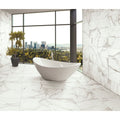 Energy Stone Calacatta Polished 30 x 60cm white marble-effect tiles with a freestanding bathtub