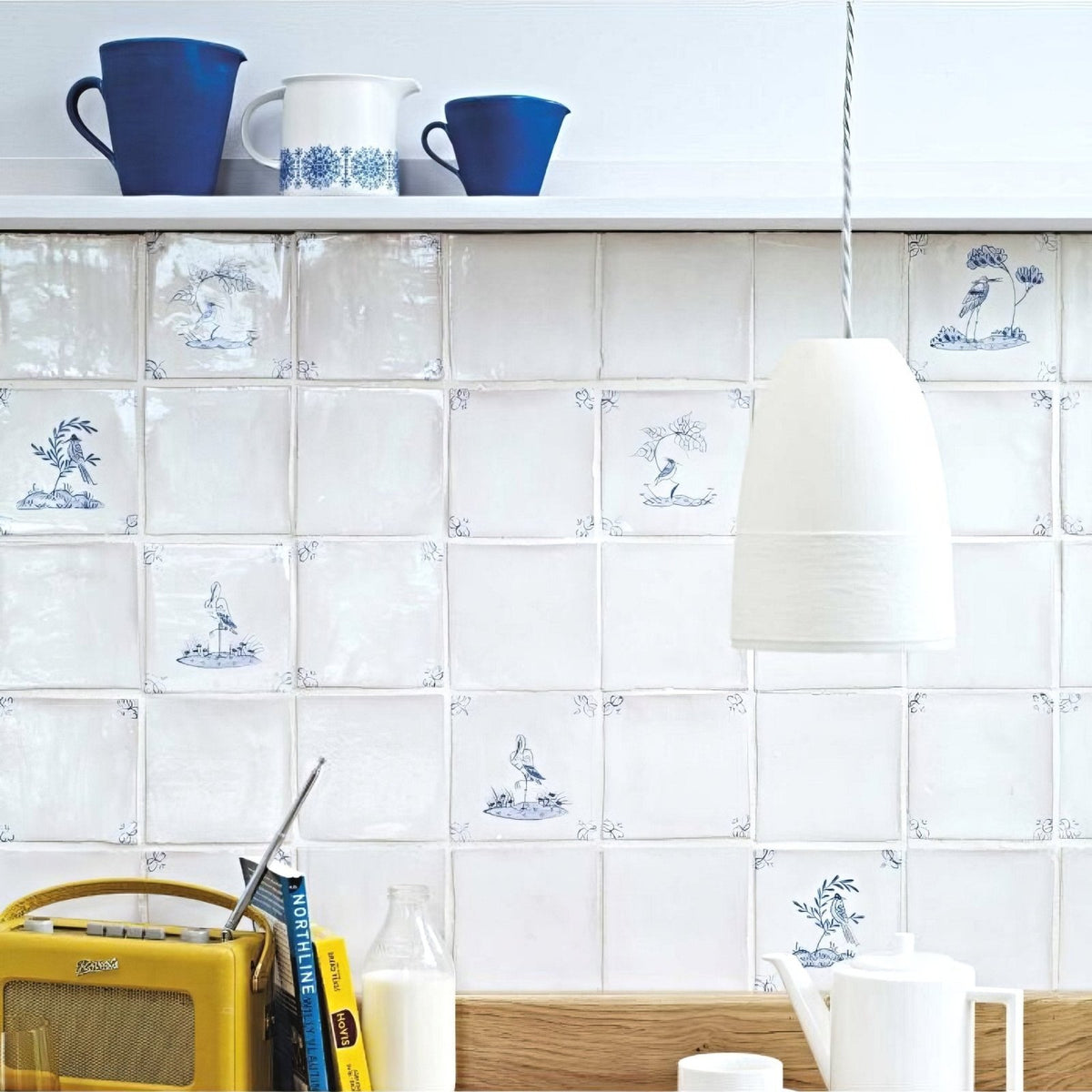 English delft butterfly 2 blue gloss tile features white ceramic with blue hand-painted bird and plant motifs backsplash