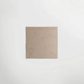 Beige english heritage marble hill white square tile with a matte slightly textured surface for flooring or walls