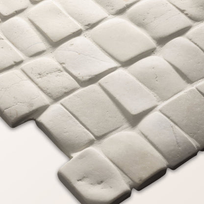 Enso Cobble Mosaic Strip Chalk white textured stone mosaic tile with subtle gray tone and irregular rectangular shapes