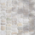 Enso Cobble Mosaic Strip Chalk with white and beige stone mosaic tiles in irregular rectangular staggered pattern