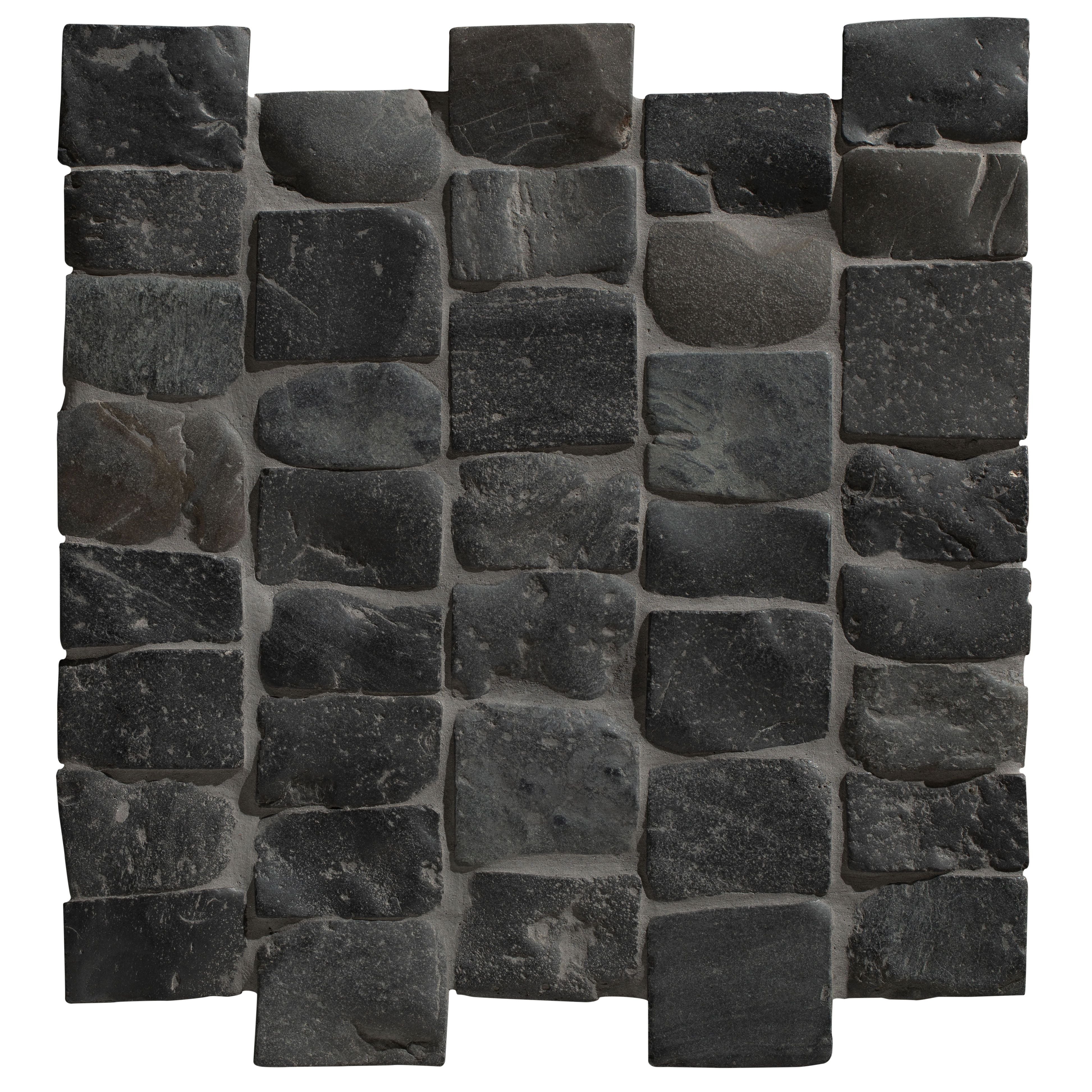 Dark gray enso cobble mosaic strip charcoal stone tile with irregular shapes and natural rustic texture