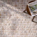Beige and gray river stone mosaic tile wall in enso cobble mosaic strip sand for decorative accents
