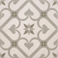 Gray and white ornate patterned tile with central starburst design from epogue green on chalk collection