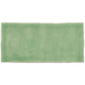 A rectangular light green ceramic half tile estuary with a subtle crackled glaze finish