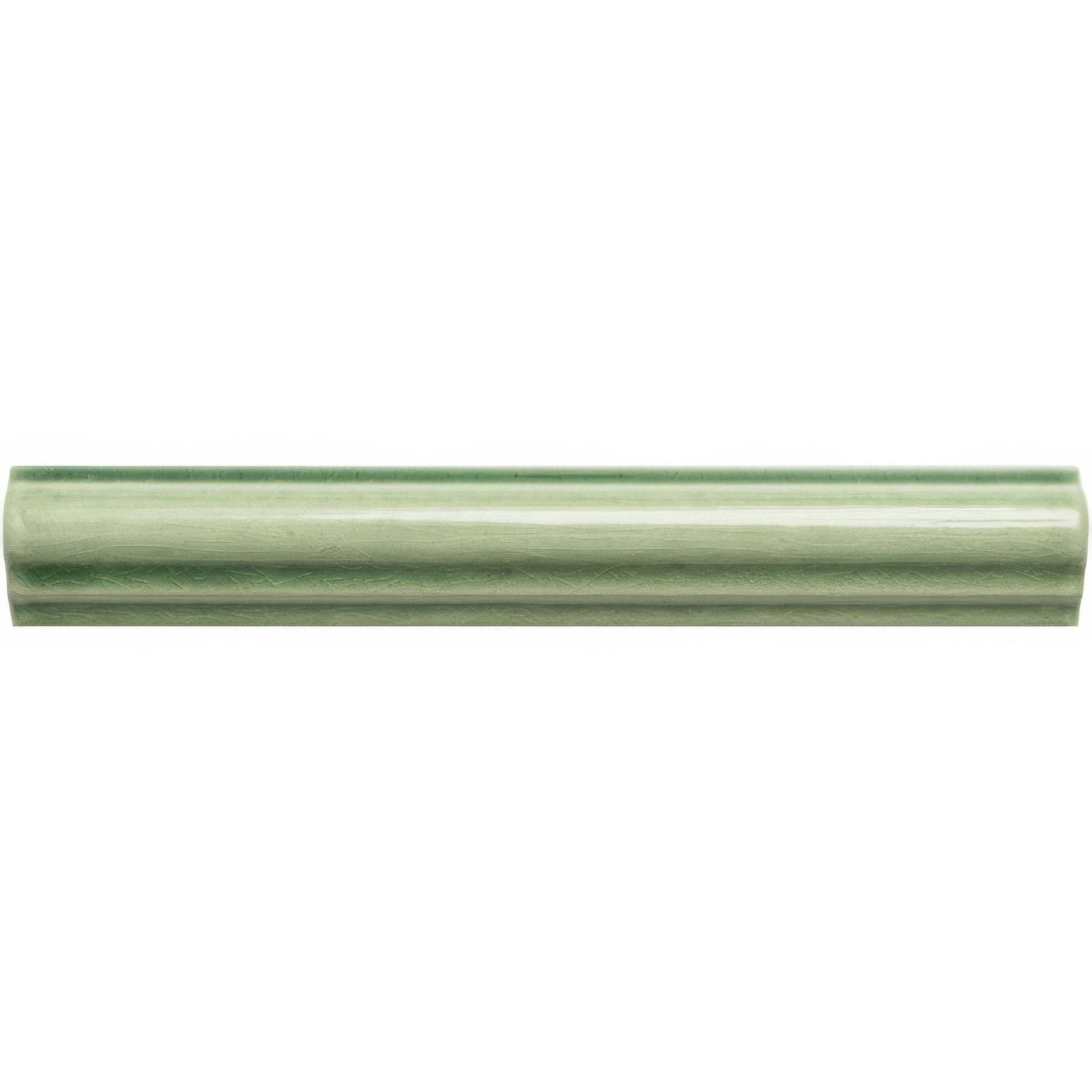 A sleek matte sage green ceramic ogee moulding tile with subtle texture and elegant fluted profile estuary design