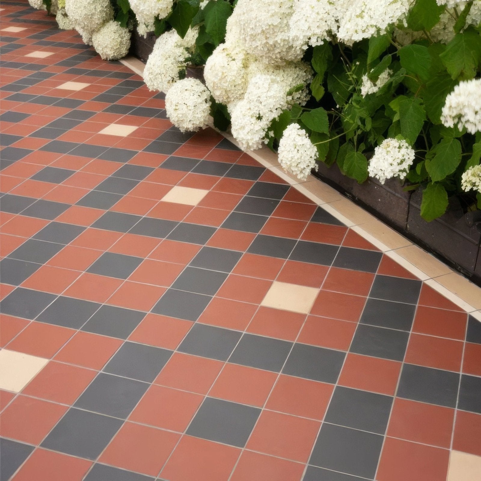 Exeter black red and white terracotta and charcoal gray checkered floor tiles with cream accents for interior flooring
