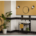 White ceramic sink with black metal faucet and matching stand featuring external wrapping piece jet black finish