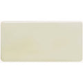 Cream-colored fennel half tile with smooth glossy surface and rounded edges for wall and backsplash use