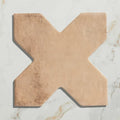 Beige terracotta fez porcelain cross cotto tile with textured slightly weathered x shape surface for flooring use