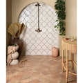 White ceramic fez porcelain star cotto tiles with black geometric patterns adorn an arched shower wall
