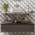Figure Shell Dark Mosaic grey and white marble scallop mosaic behind a white vessel sink