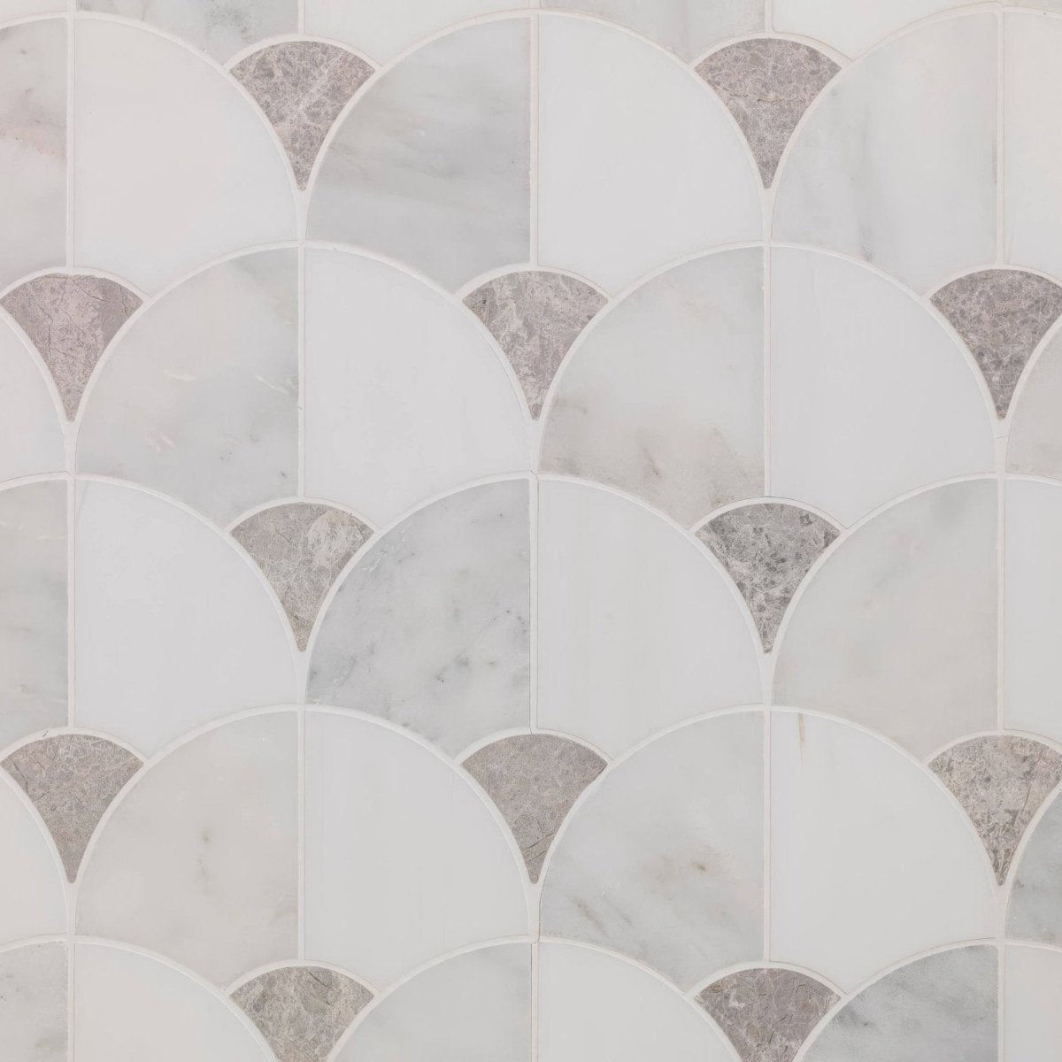 White and gray marble mosaic tiles in a repeating fan-shaped pattern for figure shell light mosaic design