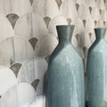 Figure Shell Light Mosaic white and grey marble fan mosaic with two teal ceramic vases