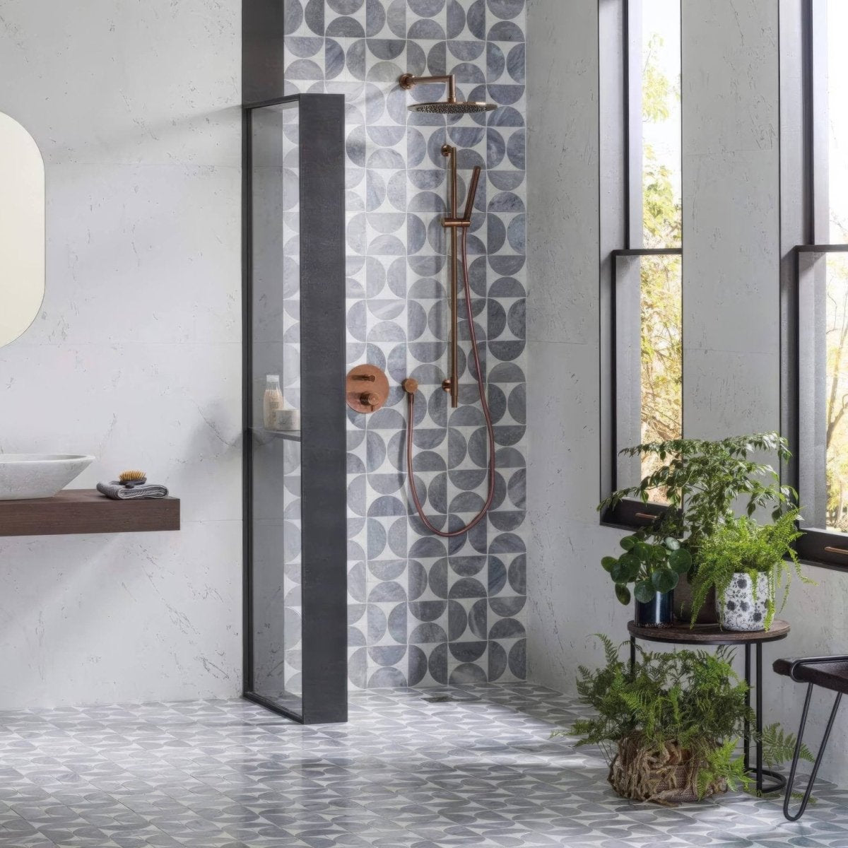 Figure Spiral Light Mosaic grey marble circle mosaic with a brass shower fixture