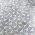 Figure spiral light mosaic gray marble tiles with swirling veining in an interlocking geometric design