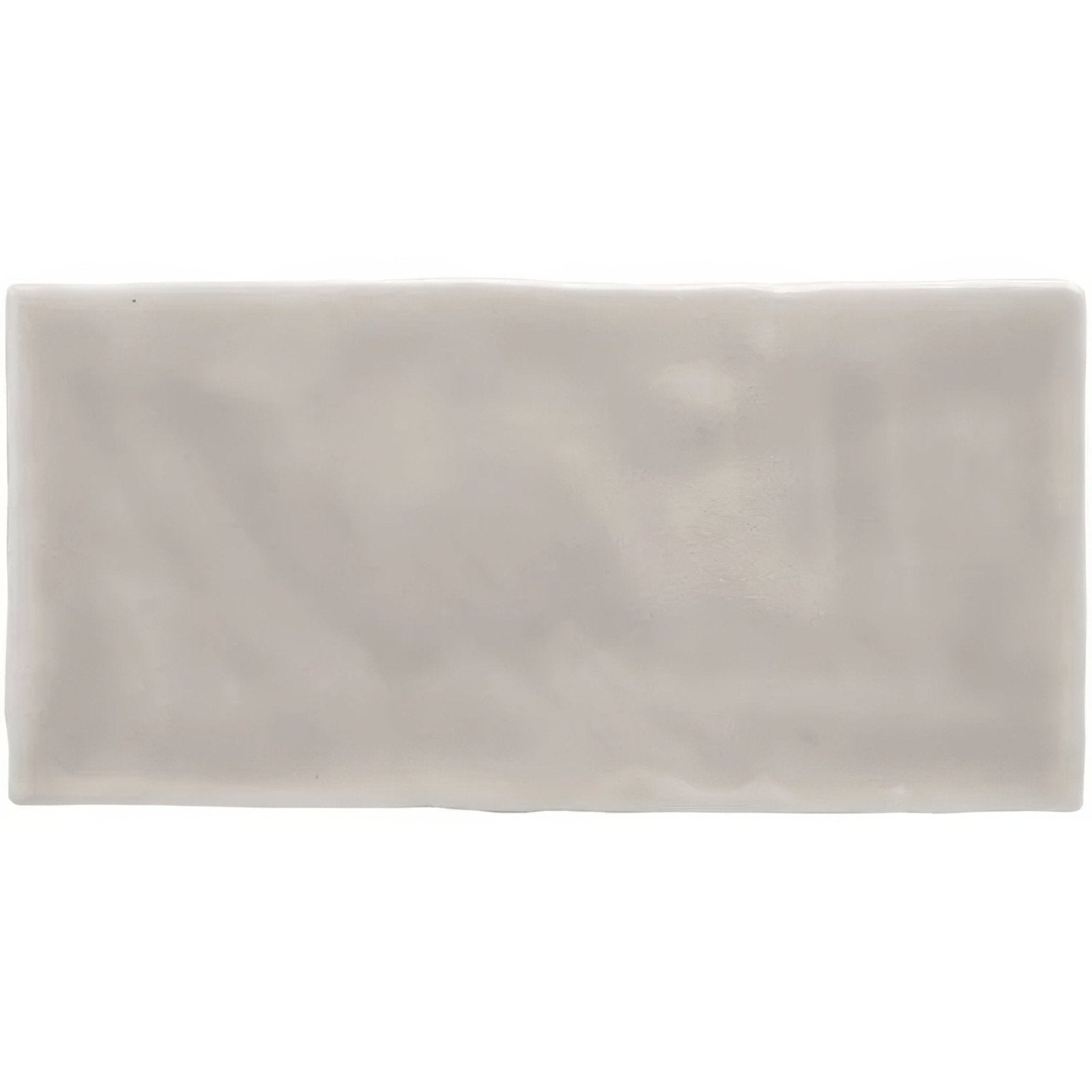 A rectangular matte-finished ceramic flint brick tile in soft off-white with subtle marbled texture