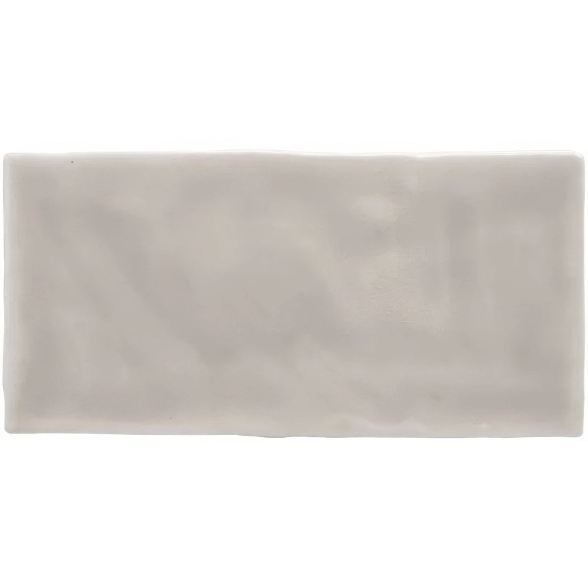 A rectangular matte-finished ceramic flint brick tile in soft off-white with subtle marbled texture