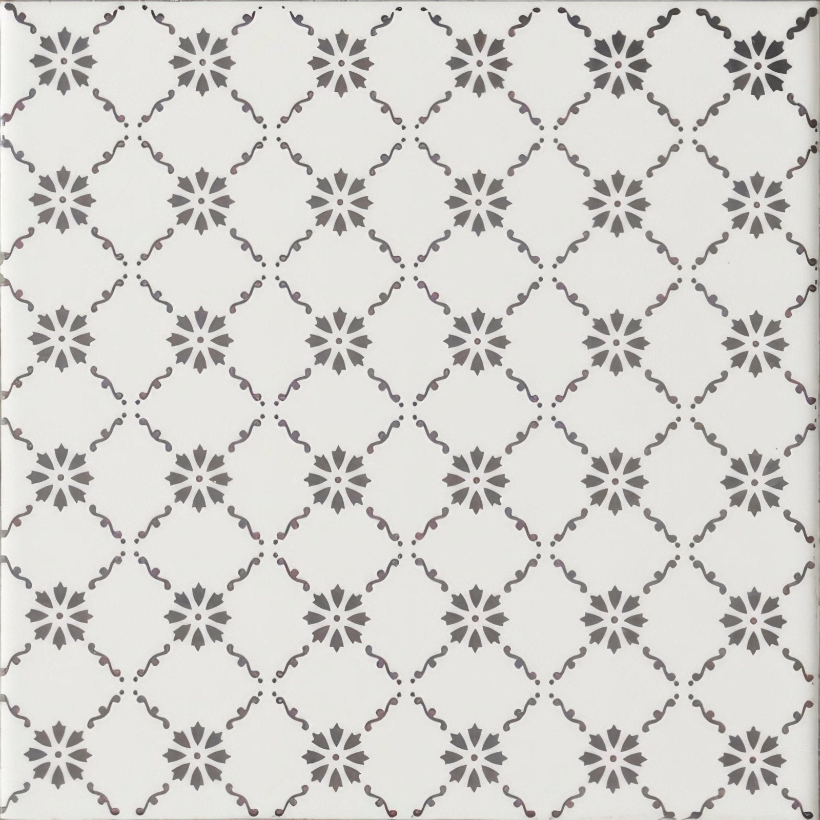 White ceramic tile floral trellis grey on brilliant white with repeating gray damask pattern and ornate scrollwork
