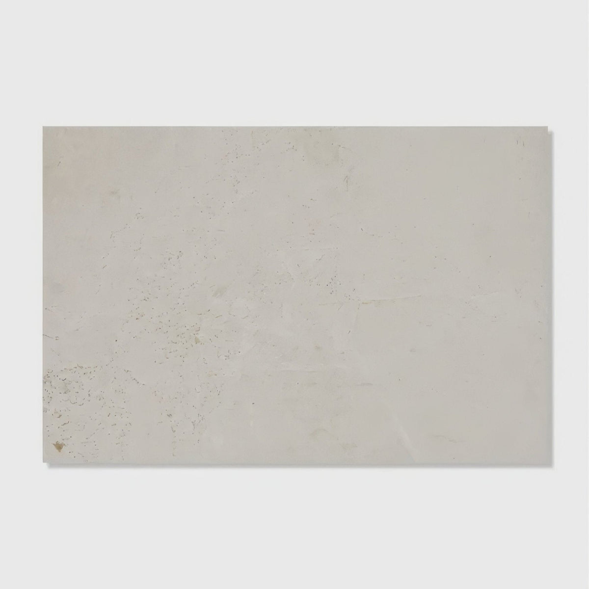 Folio marble honed finish rectangular off-white stone tile with subtle speckles and a slightly textured surface