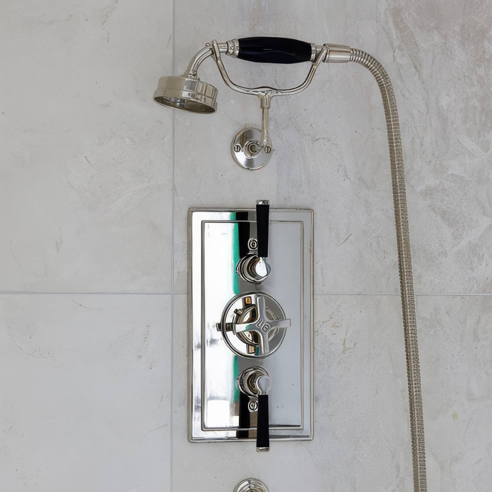 Folio marble honed finish 61 x 61cm tile with chrome finished shower system and black handle accents in modern design