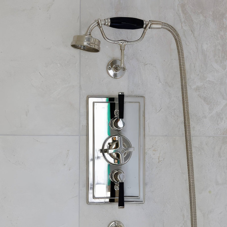 Folio Marble Honed Finish 61 x 61cm grey marble tiles with a chrome shower system