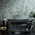 Black marble bathtub with chrome fixtures and vintage catchpole and rys kent england plaque folly porcelain moss matt finish