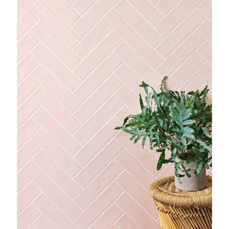 Soft pink herringbone patterned ceramic wall tiles from fondant ceramic rose collection