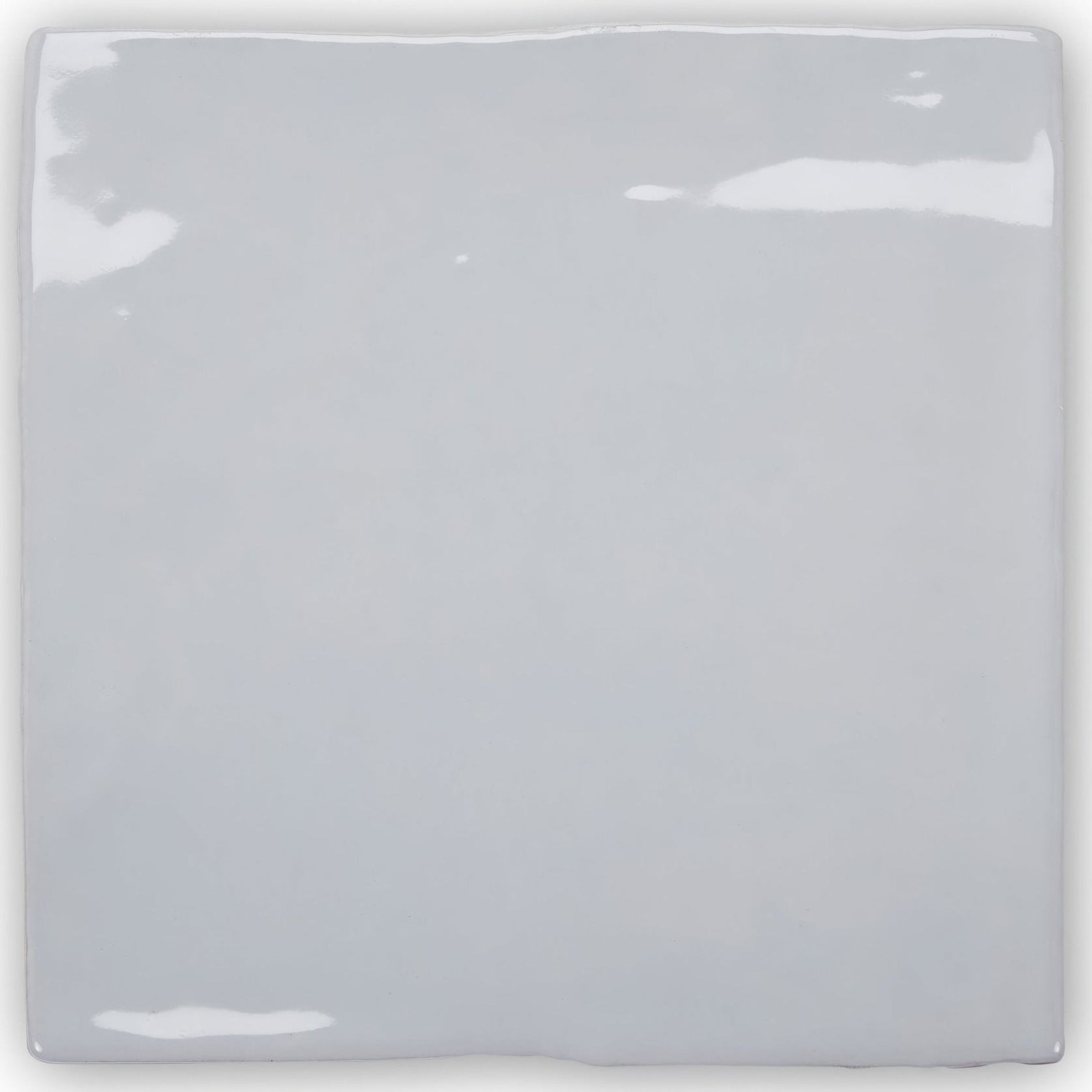 Forecast cromarty square glazed tile is a square glossy light gray ceramic tile with subtle reflective highlights