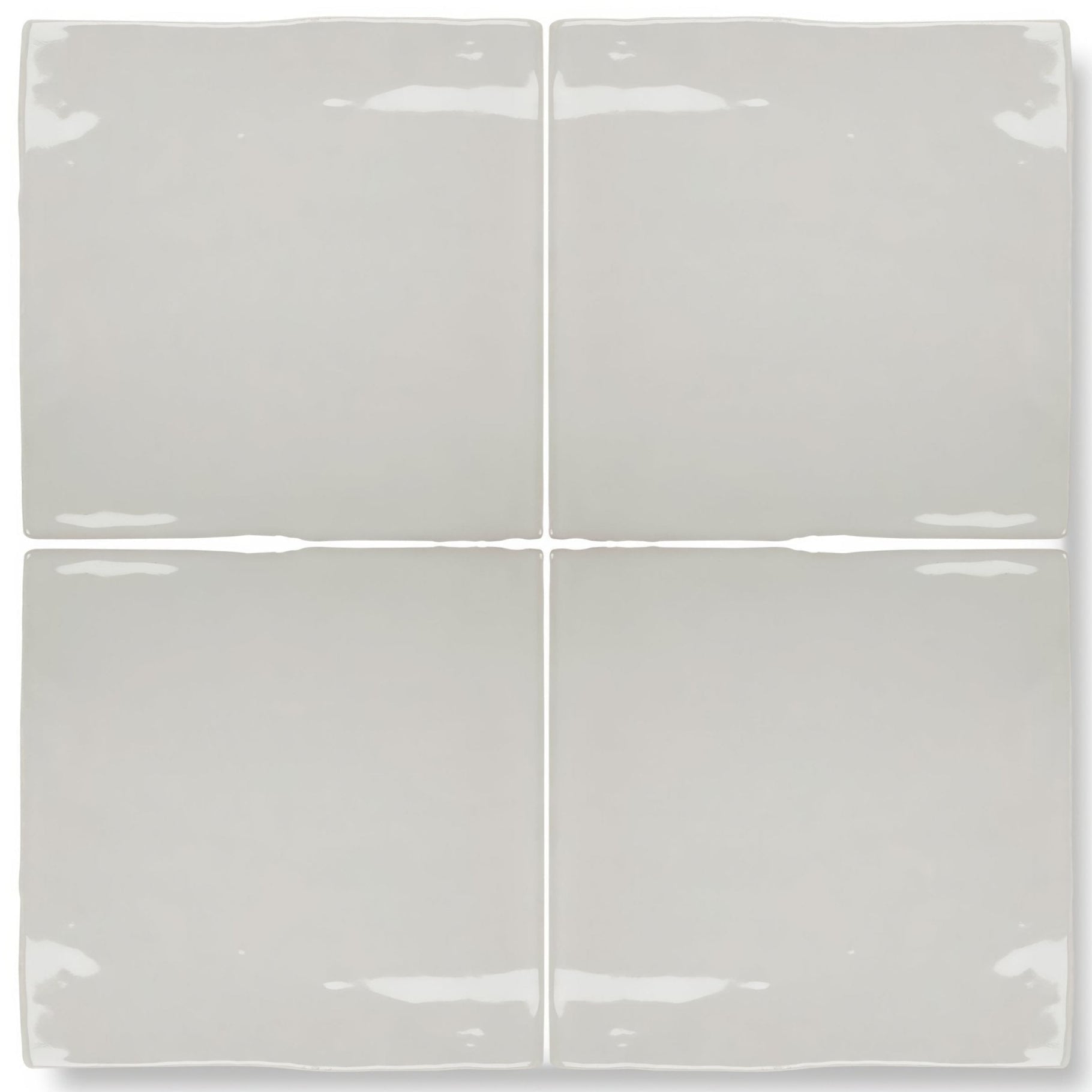 Four square, glossy gray ceramic tiles arranged in a grid.
