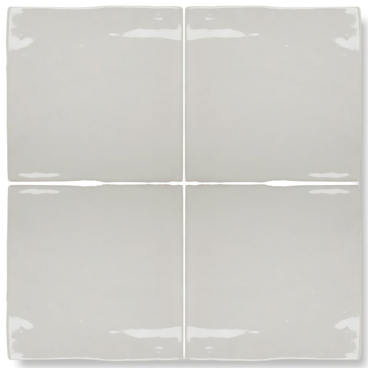 Four square, glossy gray ceramic tiles arranged in a grid.