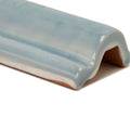 Forecast Forth glazed dado is a glossy light blue ceramic tile with a curved u-shaped profile and subtle horizontal ridges