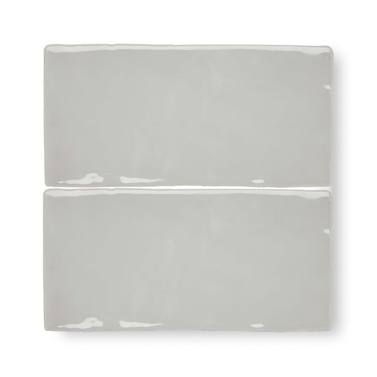 Two glossy gray rectangular ceramic Forecast Portland glazed tiles stacked vertically for wall or floor use