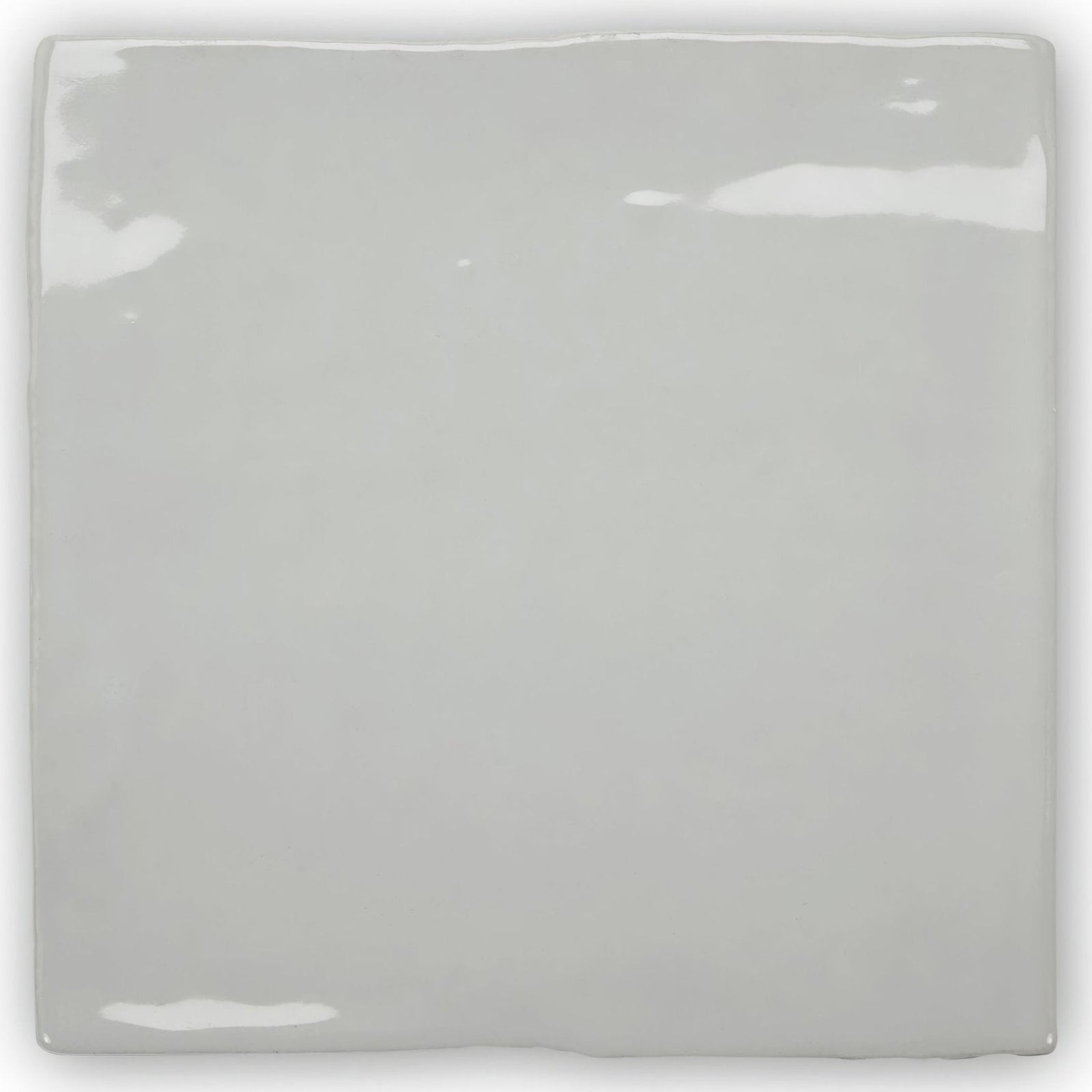 Forecast portland square glazed tile featuring a glossy gray ceramic surface with slightly uneven edges and subtle highlights