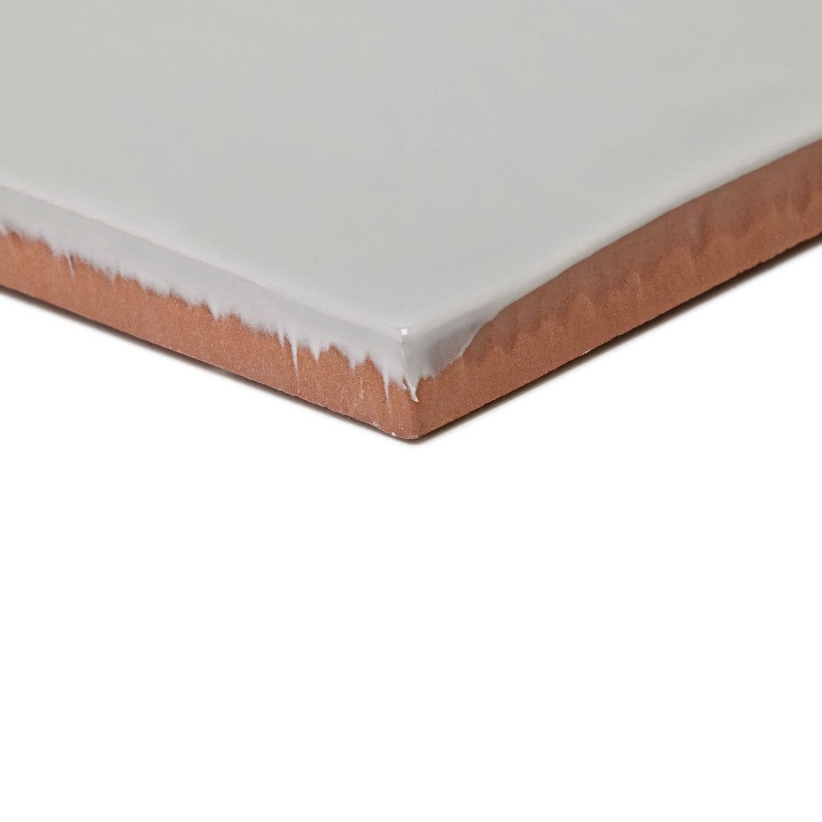 Forecast Portland square glazed tile with glossy white ceramic surface and exposed terracotta clay edge