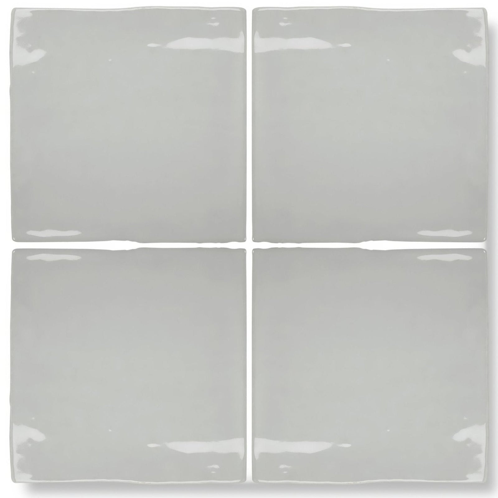 Four square forecast portland glazed ceramic tiles in matte gray with uneven edges and subtle glossy highlights