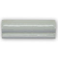 A sleek light gray Forecast Rockall glazed dado ceramic tile with smooth curved edges and subtle reflective highlights