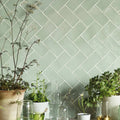 Light green herringbone patterned Forecast Rockall rectangular glazed ceramic tiles for wall and floor use