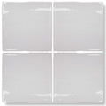 Set of four glossy white ceramic forecast sky square glazed tiles with slightly wavy edges for wall or floor use