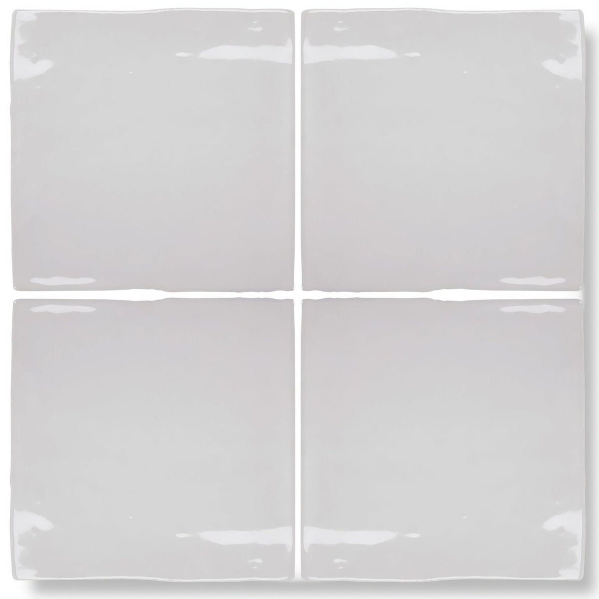Set of four glossy white ceramic forecast sky square glazed tiles with slightly wavy edges for wall or floor use