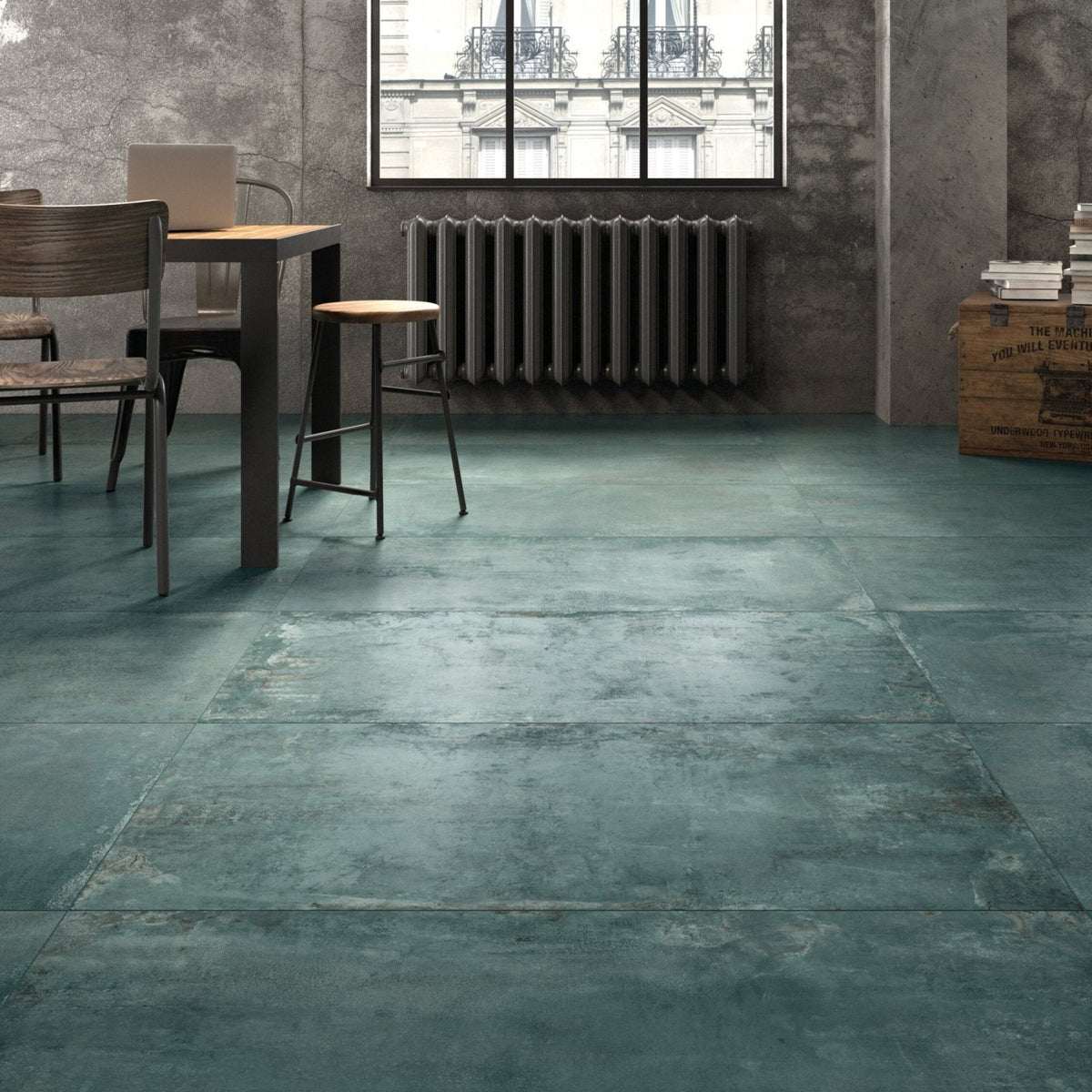 Forged emerald porcelain tile featuring teal-green concrete-effect floor tiles with a matte textured finish