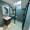 Forged Emerald Porcelain Tile teal-green porcelain tile in a bathroom