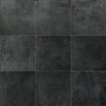 Dark gray textured forged iron porcelain tile with matte finish and subtle tone variations for flooring use