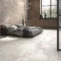 Gray forged titanium porcelain tile with concrete effect matte finish and subtle textured surface for flooring